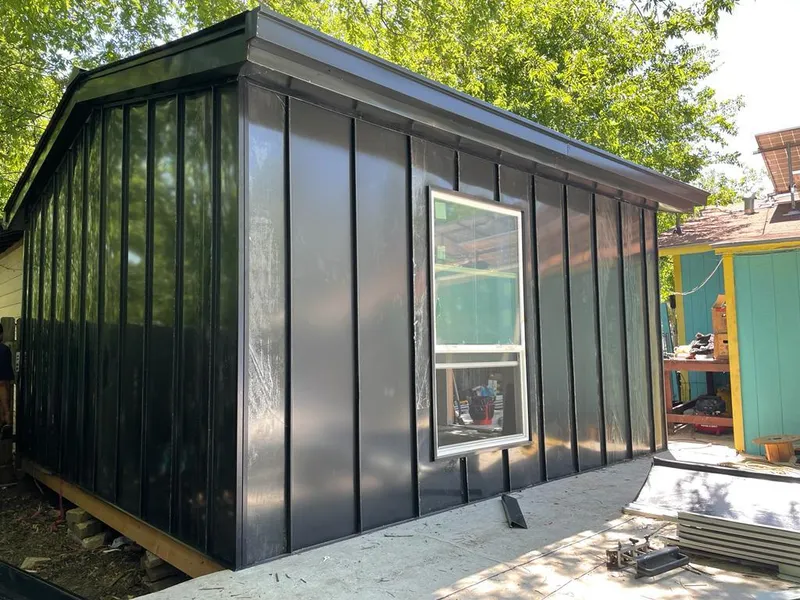 Black standing seam metal wall panels for Roof Inspection in Minneapolis